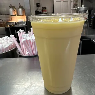 a smoothie in a plastic cup