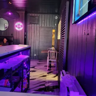 a woman sitting at a bar