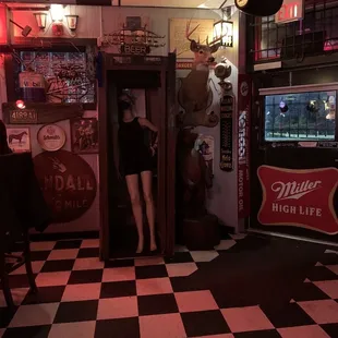a mannequin in the doorway