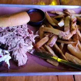 Pulled Pork Sandwich  8/10-  Homecut Fries 7/10- Slaw 7/10