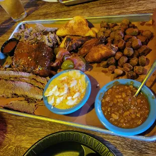 Sampler platter w/ brisket, ribs, and pulled pork