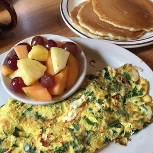 Spinach Feta omelette with fruit &amp; cakes