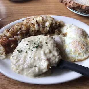 Chicken fried steak, hashbrowns with onions, eggs over medium