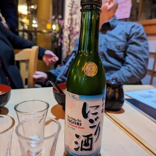 Sho Chiku Bai Nigori Unfiltered Sake. Silky Mild. $17. Good.