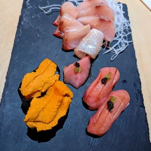 Uni (sea urchin, market price), Otoro (super fatty bluefin tuna belly, $17), and Kampachi (amberjack sashimi, 6 for $28).