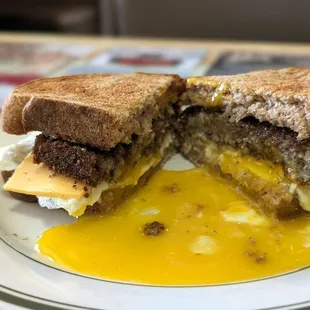 Livermush, egg, and cheese on toasted wheat. Love is a runny egg!
