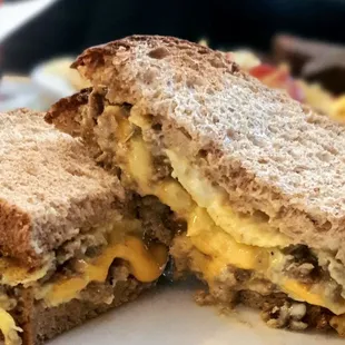 Sausage shipwreck with cheese on wheat toast, $4