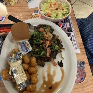 This is a new dish we tried! An 8oz steak w veggies on top- absolutely delicious!!