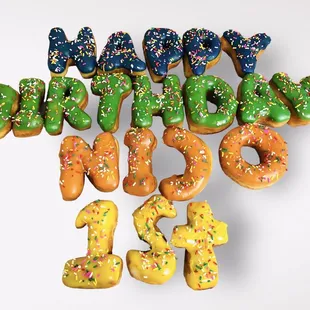 a number of donuts with sprinkles