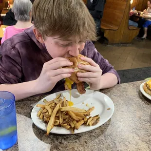 Ian enjoying the Clark Burger...named after his family!