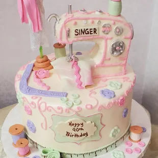 a cake decorated with a sewing machine
