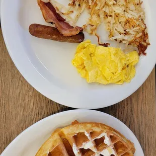 waffles, eggs, bacon and hash browns