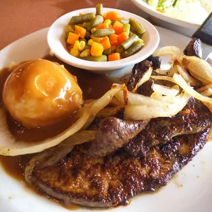 Liver and onions with mashed potatoes and steamed veggies.