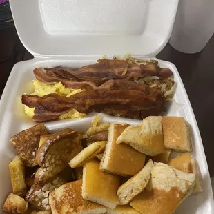 My BIG breakfast with both pancake and French toast, scrambled eggs, hash brown and bacon