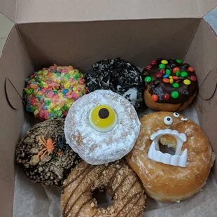 a variety of donuts in a box