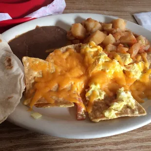 Chilaquiles with papas rancheras