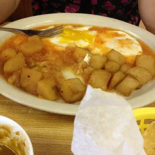 Huevo rancheros with double potatoes