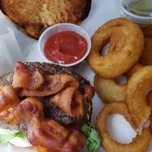 a burger and onion rings