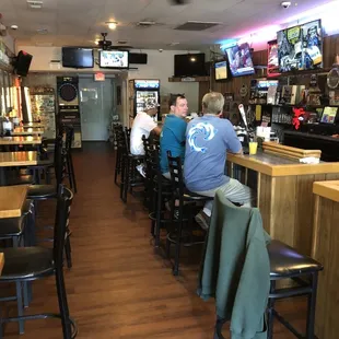 customers sitting at the bar