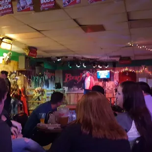 a group of people sitting at tables