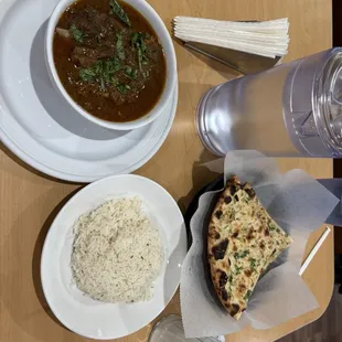 Goat curry with garlic naan.