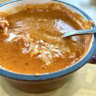 Butter Chicken:  Tender chicken pieces in a creamy tomato-based sauce.