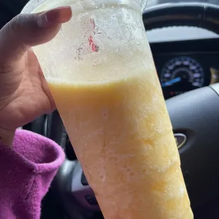Mango , Pineapple, orange smoothie .