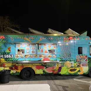 a food truck parked in a parking lot