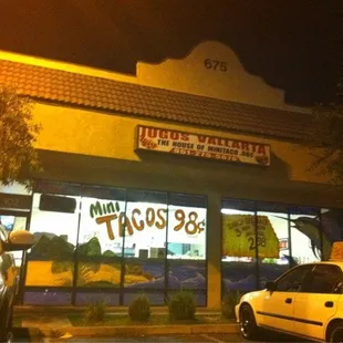 a taco shop at night