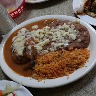 Chile relleno. Really good. Stuffed with cheese. Served with rice and beans.
