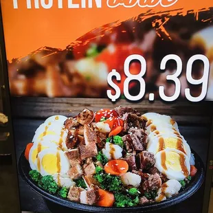 a sign for a protein bar