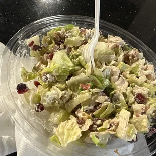 a salad in a plastic container