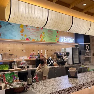 a woman standing at the counter