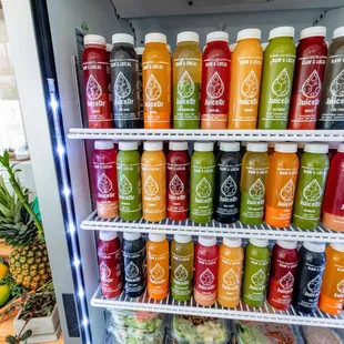 a fridge full of juices
