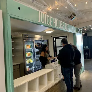 a man and a woman at a counter