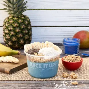 a bowl of yogurt and bananas