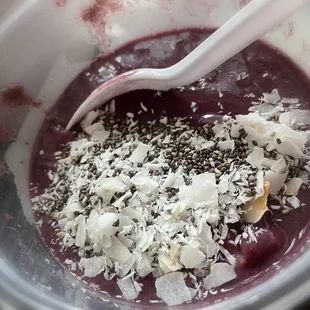 Acai Bowl, fruits, granola, etc on the side, so you can put in as much or little as you like. (Delivered)