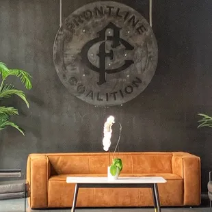 a coffee table with a vase on it