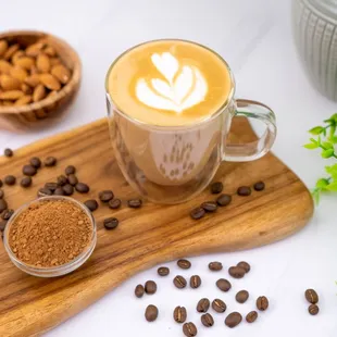 a cup of coffee and some coffee beans