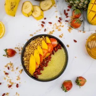 a bowl of fruit and granola
