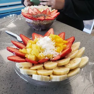 Large bowl acai base with chunky monkey topping and large bowl acai base aloha topping