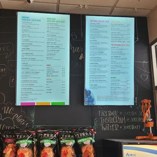 menus on the wall of a grocery store