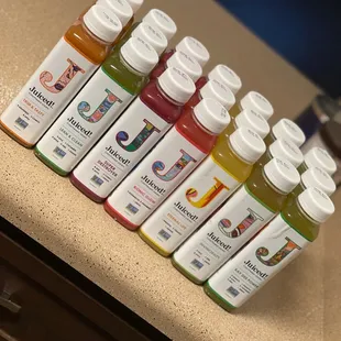 a variety of cold - pressed juices