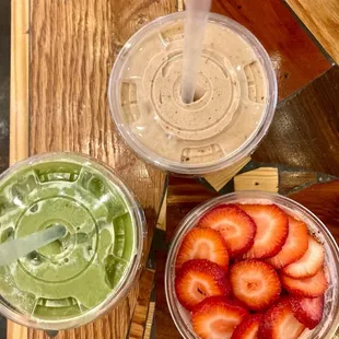 strawberries and a smoothie on a table