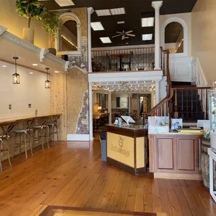 a view of a kitchen and dining area