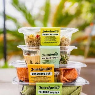a stack of juiceland juices