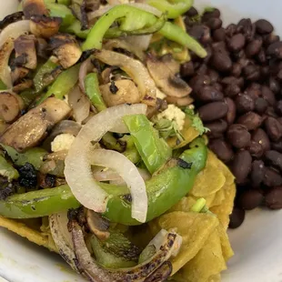Chilaquiles with mushroom mix and black beans