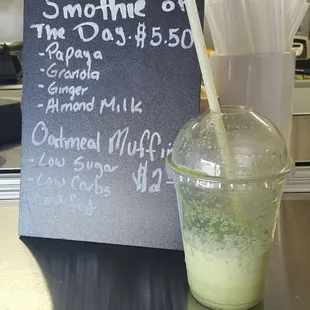 a smoothie in a plastic cup