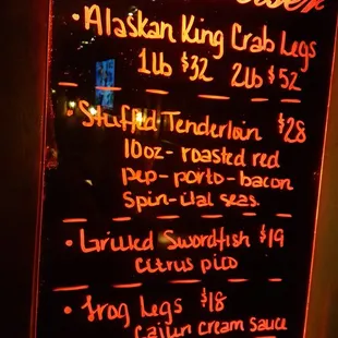 a neon sign in a dark room