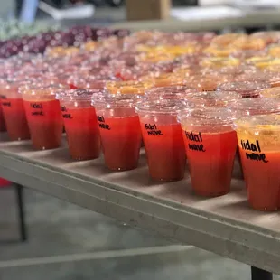 a table full of juices